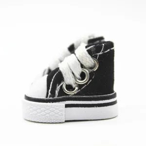 Detailed side view of 3.5cm mini black canvas shoes for dolls or keychain charms