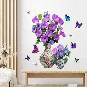 Détail de stickers muraux vase de fleurs avec papillons colorés sur un mur blanc
