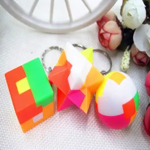 Close-up view of 2.5cm colorful 3D interlocking puzzle keychains in various shapes
