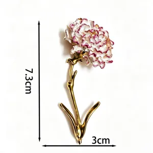 Detail of the white and purple enamel carnation brooch showing 7.3cm height and 3cm width