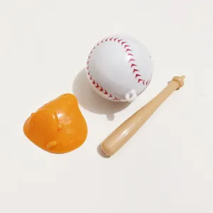 Miniature baseball set accessory with white ball, tan bat, and orange glove