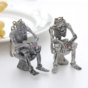 Creative resin skeleton sitting on a toilet keychain accessory for Halloween party gift