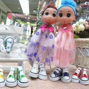 Variety of colorful 3.5cm miniature canvas shoes for dolls and cute toy keychains