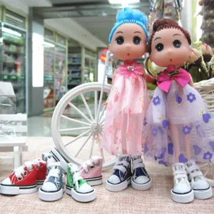 Detailed view of various colorful 3.5cm mini canvas shoes designed for fashion dolls and toys