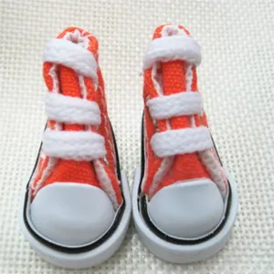 Pair of 3.5cm mini orange canvas sneakers for doll accessories or keychains