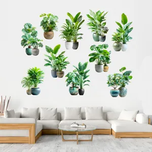 Modern living room scene showing various green plant wall stickers above a white sofa