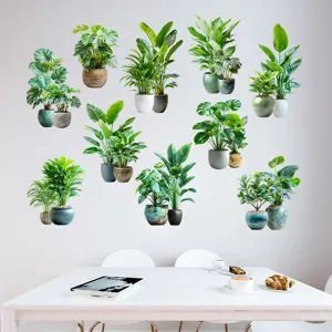 Various tropical potted plant wall stickers displayed in a modern dining room setting.