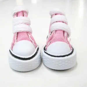 Close-up detail view of 3.5cm pink miniature canvas high-top sneakers for dolls