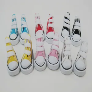 Collection of miniature 3.5cm canvas sneakers for dolls in a variety of vibrant colors