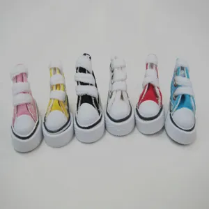 Macro view of assorted 3.5cm miniature canvas shoes for doll accessories and keychains