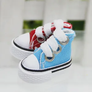 Detailed macro view of 3.5cm mini canvas sneakers for doll accessories or keychains
