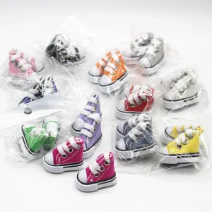 Collection of colorful 3.5cm mini canvas doll sneakers in clear individual packaging