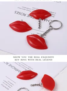 Detailed macro shot of glossy red resin lip keychain charms on white background