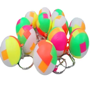 Colorful 2.5cm mini 3D puzzle ball keychains for kids party favors and school gifts.