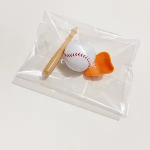 Macro detailed view of mini sports baseball set including bat ball and glove in package