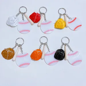 Colorful baseball keychain set featuring mini leather gloves, bats, and acrylic discs