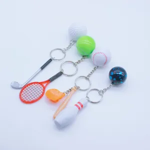 Set of 4 mini sports keychains including golf tennis baseball and bowling pins