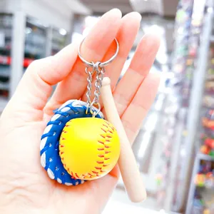 Detailed close-up of a sports-themed baseball keychain with mini bat, glove, and ball