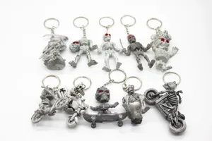 Set of creative Halloween skeleton keychains with various spooky poses and designs.