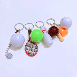 Detailed view of assorted mini sports keychains including golf, tennis, and bowling.