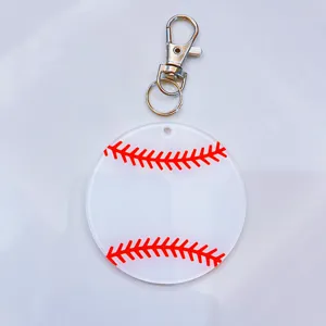 Transparent acrylic baseball keychain featuring red stitching print and metal swivel clasp.