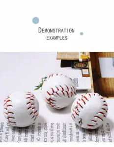 Close-up detail of mini baseball pendants with red hand-stitched seams.