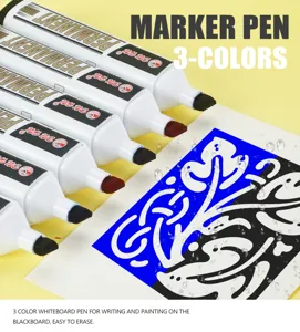 Close-up of three-color waterproof permanent markers with broad tips and quick-dry ink