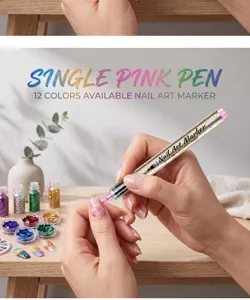 Detailed shot of 0.5mm pink nail art marker pen for precise DIY floral designs on nails.