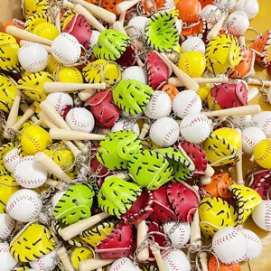 Detailed macro view of colorful baseball keychain sets with mini bat and glove charms