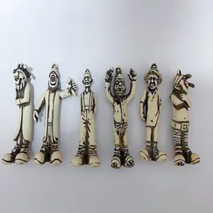 Detailed view of six unique Halloween ghost figurines for spooky keychains and pendants.