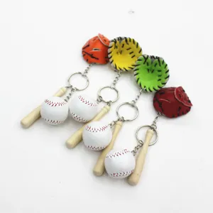 Detailed view of four colorful baseball keychain sets with wooden bat and glove charms.