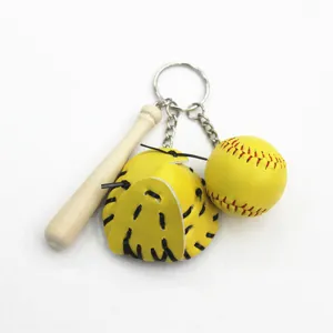 Mini baseball keychain featuring a wooden bat, yellow glove, and ball detail