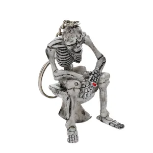 Funny resin skeleton sitting on toilet keychain with cigarette for Halloween gift