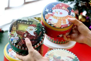 Boite ronde en metal de Noel pour biscuits avec joli design de bonhomme de neige pour cadeau