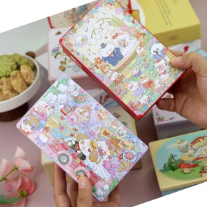 Macro view of cute rabbit wedding illustration on rectangular tinplate gift boxes