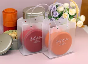 Set de bolsas de regalo transparentes de PVC con latas redondas para galletas y detalles.