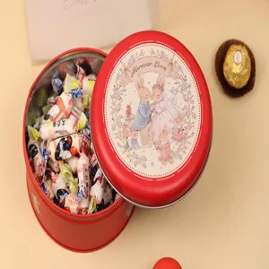 Detailed view of red round wedding tin box with rabbit illustration and Forever Love text