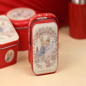 Boîte en fer-blanc pour cadeaux de mariage avec illustration de couple de lapins, idéale pour dragées.