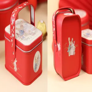 Boîte cadeau en métal rouge pour mariage bonbon boîte avec illustration de lapin et poignée.
