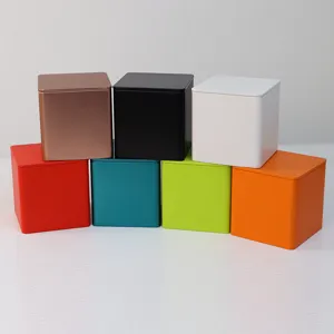 Set of seven colorful square tinplate tea canisters in matte finish for loose tea storage