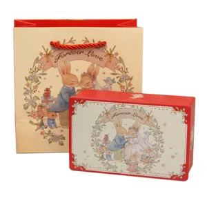 Square wedding candy tin box and matching paper gift bag with cute rabbit theme