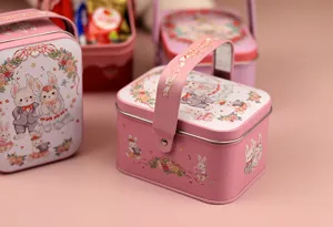 Pink wedding candy tin box with cute rabbit bride and groom illustration and handle.