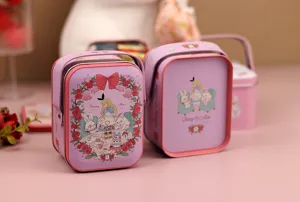 Boîte cadeau en fer-blanc avec design de dessin animé mignon, idéale pour bonbons et cadeaux.