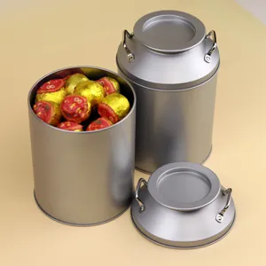 Vintage milk can shaped tinplate tea caddy with dual handles and lid for loose leaf tea storage.