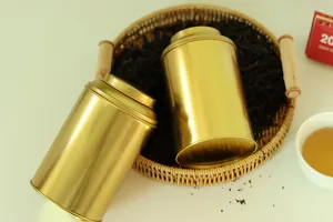 Gold metal tea tin for loose leaf storage, airtight tinplate canister with lid, kitchen caddy.
