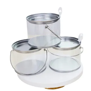 Secchiello regalo trasparente in PVC con coperchio in metallo, ideale per feste e confezioni regalo.