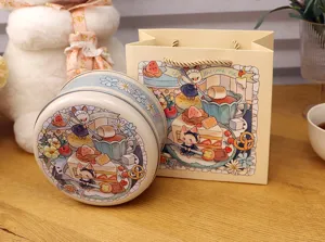 Scatola di latta rotonda con gatto disegnato a mano e borsa regalo in carta