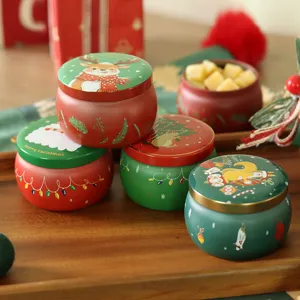 Boîte en métal en forme de tambour de Noël au design festif pour emballage de cadeau et bougie