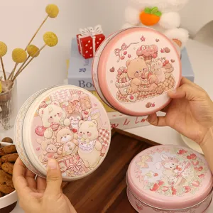 Boîte cadeau ronde en fer-blanc avec jolis dessins d'ours, idéale pour biscuits et emballage.