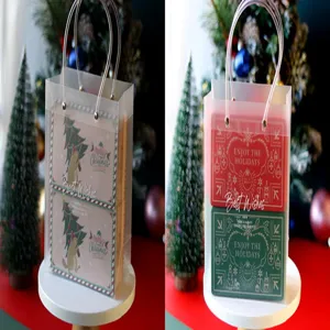 Sac cadeau transparent de Noël avec des boîtes métalliques rectangulaires pour biscuits.